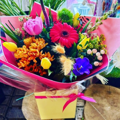 Good Vibrations - A fun and vibrant arrangement bursting with bold, cheerful colours and beautifully presented in a bright gift box.