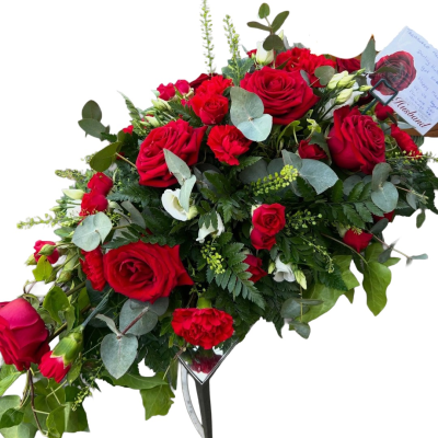 Tear Drop Rose & Carnations - An elegant teardrop funeral tribute arranged in rich red roses and carnations with fresh greenery and delicate white accents.